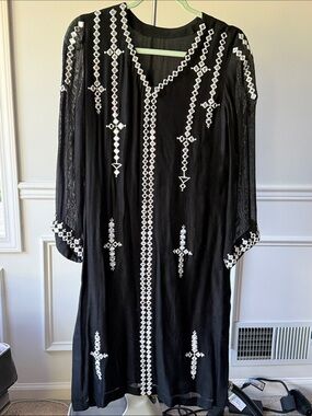 Black Embroidered V-Neck Women's kurta with mirror work.